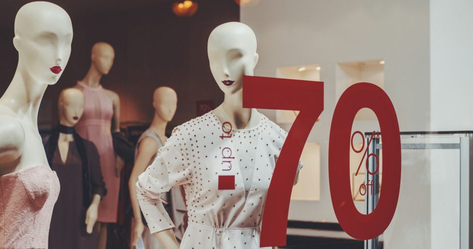 a display of mannequins in a store window